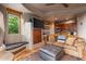 Comfortable living area with a kitchenette and built-in seating at 40523 N 102Nd Pl, Scottsdale, AZ 85262