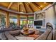Open living area with a cozy fireplace and stunning views at 40523 N 102Nd Pl, Scottsdale, AZ 85262