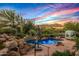 Stunning pool and patio area with mountain views and desert landscaping at 40523 N 102Nd Pl, Scottsdale, AZ 85262