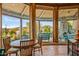 Bright breakfast nook with scenic views and a stone floor at 40523 N 102Nd Pl, Scottsdale, AZ 85262