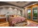 Serene bedroom with access to a private patio at 40523 N 102Nd Pl, Scottsdale, AZ 85262