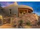 Stunning exterior with stonework and architectural details at 40523 N 102Nd Pl, Scottsdale, AZ 85262