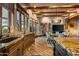 Open kitchen with granite countertops and wood cabinets at 40523 N 102Nd Pl, Scottsdale, AZ 85262