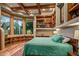 Bright bedroom with a large window and wood beams at 40523 N 102Nd Pl, Scottsdale, AZ 85262
