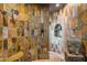Large walk-in shower with stone tile, dual shower heads, and built-in bench at 40523 N 102Nd Pl, Scottsdale, AZ 85262