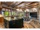 Open kitchen and dining area with a large island and views to a patio at 40523 N 102Nd Pl, Scottsdale, AZ 85262