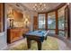 Game Room with pool table and large windows at 40523 N 102Nd Pl, Scottsdale, AZ 85262
