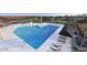 Resort-style pool with a fun water playground, perfect for families and relaxation at 9963 W Cora Ln, Avondale, AZ 85392