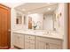 Bathroom with double vanity and tile floors at 10044 E Graythorn Dr, Scottsdale, AZ 85262