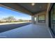 Covered patio with tiled flooring and views of the desert landscape at 13272 E La Junta Rd, Scottsdale, AZ 85255