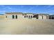 New construction home with beige facade and three-car garage at 13272 E La Junta Rd, Scottsdale, AZ 85255