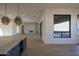 Modern kitchen with large island, stainless steel appliances, and custom cabinetry at 13272 E La Junta Rd, Scottsdale, AZ 85255