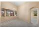 Formal dining room with a chandelier and access to another room at 17828 W Mariposa Dr, Surprise, AZ 85374