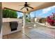 Outdoor patio with built-in grill and ceiling fan at 17828 W Mariposa Dr, Surprise, AZ 85374