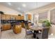 Eat-in kitchen with island and stainless steel appliances at 17828 W Mariposa Dr, Surprise, AZ 85374
