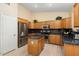 Modern kitchen with stainless steel appliances and granite counters at 17828 W Mariposa Dr, Surprise, AZ 85374