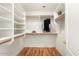 Large walk-in closet with ample shelving and hanging space at 17828 W Mariposa Dr, Surprise, AZ 85374