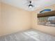Bright bedroom featuring a large window with sunburst design at 17828 W Mariposa Dr, Surprise, AZ 85374