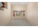 Dining room with bay window, chandelier, and carpeted floor at 17828 W Mariposa Dr, Surprise, AZ 85374