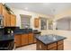 Open kitchen with island and view to living room at 17828 W Mariposa Dr, Surprise, AZ 85374