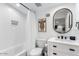 Bathroom with white subway tile, bathtub, and updated vanity at 3014 N 61St Pl, Scottsdale, AZ 85251