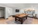 Game room with a pool table and additional space for entertainment at 3014 N 61St Pl, Scottsdale, AZ 85251