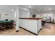 Game room with poker table and adjacent pool table at 3014 N 61St Pl, Scottsdale, AZ 85251