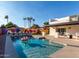 Inviting backyard oasis with a sparkling pool and fun backyard games at 3014 N 61St Pl, Scottsdale, AZ 85251