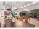 Elegant dining room with a large table and a modern chandelier at 3014 N 61St Pl, Scottsdale, AZ 85251