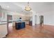 Kitchen with island, stainless steel appliances and view into Gathering room at 16914 E Britt Ct, Fountain Hills, AZ 85268