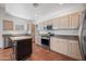 Modern kitchen with stainless steel appliances and an island at 16914 E Britt Ct, Fountain Hills, AZ 85268