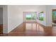 Dining room with wood-look laminate floors and large windows at 16914 E Britt Ct, Fountain Hills, AZ 85268
