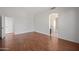 Well-lit bedroom with hardwood floors and bathroom access at 16914 E Britt Ct, Fountain Hills, AZ 85268