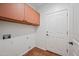 Laundry room with upper cabinets and tile flooring at 16914 E Britt Ct, Fountain Hills, AZ 85268
