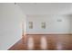 Living room with wood-look laminate flooring and neutral walls at 16914 E Britt Ct, Fountain Hills, AZ 85268