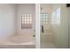 Clean bathroom with a shower and a tub at 16914 E Britt Ct, Fountain Hills, AZ 85268