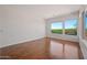 Spacious bedroom with hardwood floors and large windows with a view at 16914 E Britt Ct, Fountain Hills, AZ 85268