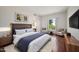 Main bedroom with hardwood floors and virtual staging at 16914 E Britt Ct, Fountain Hills, AZ 85268