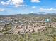 Aerial view of home with McDowell Mountains in the background at 16914 E Britt Ct, Fountain Hills, AZ 85268
