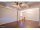 Spacious dining room with hardwood floors, high ceilings, and chandelier at 17186 W Post Dr, Surprise, AZ 85388