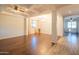 Spacious dining room with hardwood floors, high ceilings, and chandelier at 17186 W Post Dr, Surprise, AZ 85388