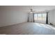 Light and airy bedroom with large windows and ceiling fan at 17186 W Post Dr, Surprise, AZ 85388