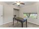 Spacious bedroom featuring a desk, closet, and natural light at 10408 N 11Th St # 2, Phoenix, AZ 85020