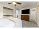 Spacious bedroom with large TV and walk-in closet at 10408 N 11Th St # 2, Phoenix, AZ 85020
