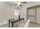Versatile bedroom with a desk, closet, and ceiling fan at 10408 N 11Th St # 2, Phoenix, AZ 85020