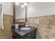 Bathroom with dark vanity and tile flooring at 10408 N 11Th St # 2, Phoenix, AZ 85020
