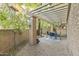 Relaxing patio space with pergola and brick flooring at 10408 N 11Th St # 2, Phoenix, AZ 85020