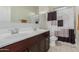 Bathroom with double vanity and shower/tub combo at 30009 W Monterey Dr, Buckeye, AZ 85396