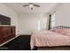Spacious bedroom with a king-size bed and dresser at 30009 W Monterey Dr, Buckeye, AZ 85396