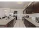 Modern kitchen with stainless steel appliances and granite countertops at 30009 W Monterey Dr, Buckeye, AZ 85396